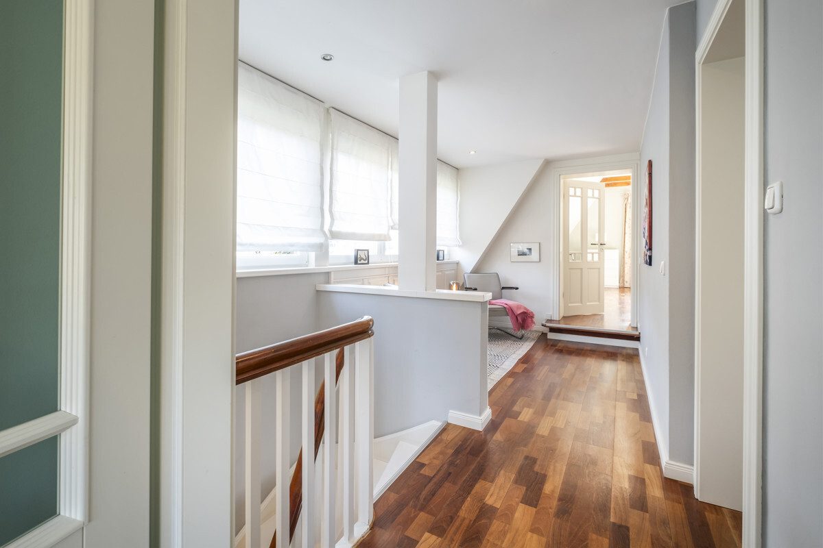 First-floor hallway with a seating area