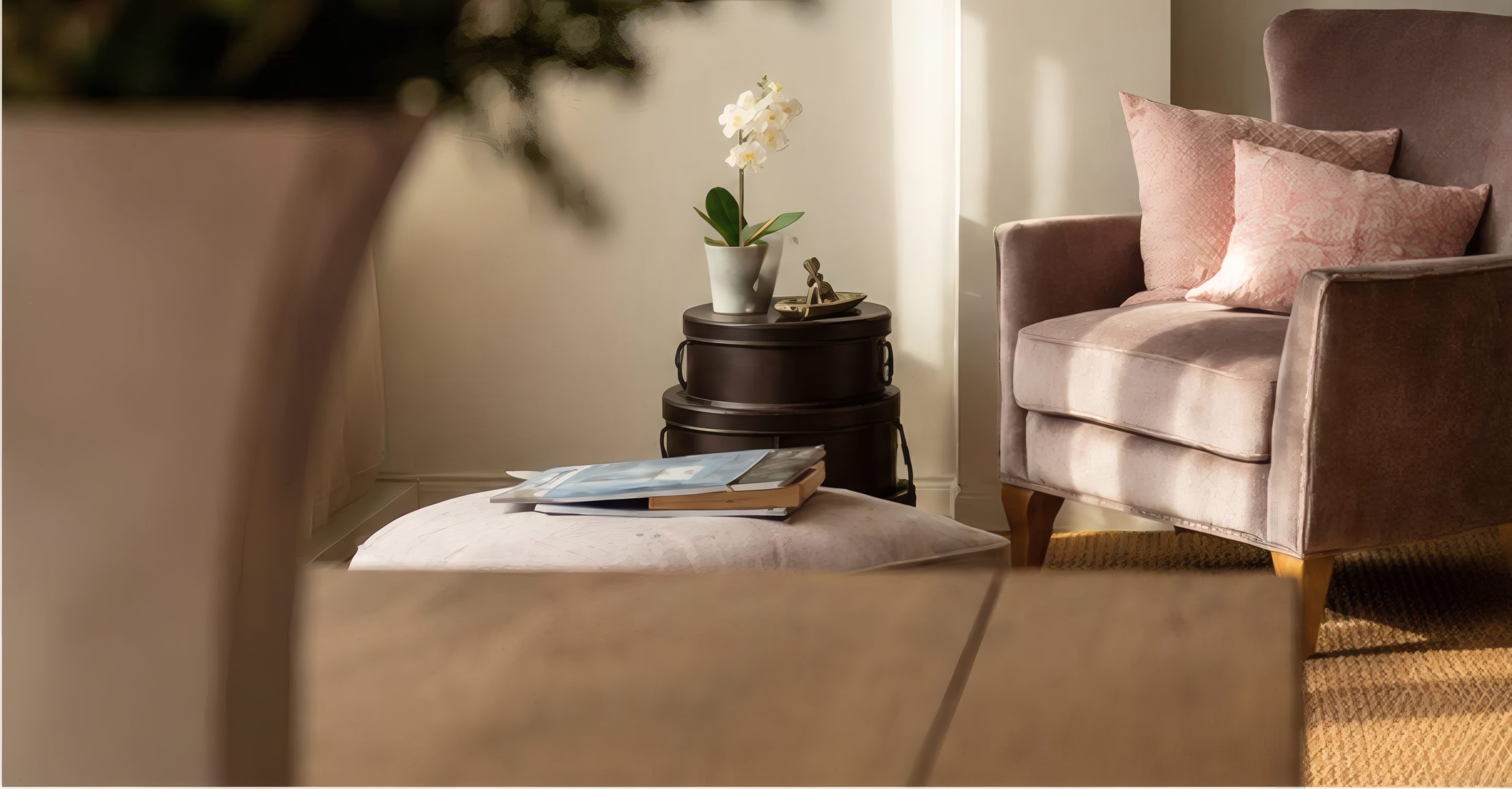 Home staging detail with an armchair and an orchid