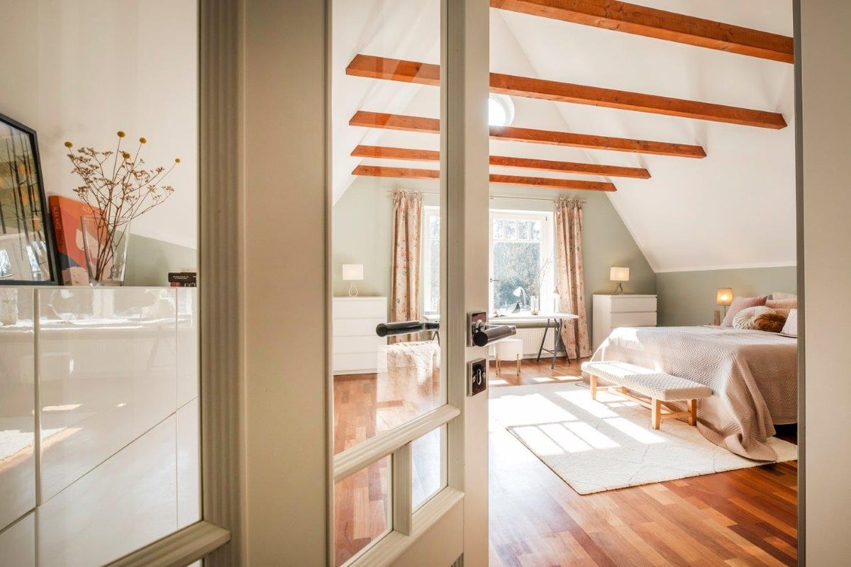 Bright living room with wooden beams